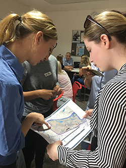 EPA staff consulting with community members