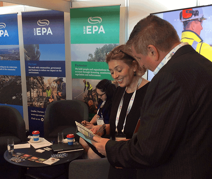 Amanda Kane and Councillor Bernard Purcell in front of EPA banners