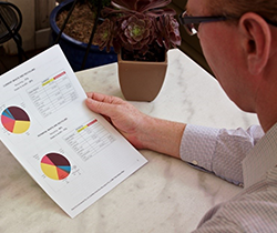 man looking at a Bin Trim report