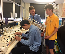 students making cardboard straws