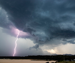 dark storm clouds with lightning bolt