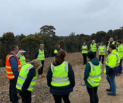 group of people wearing hi-viz vests