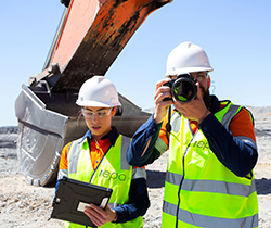 two EPA officers monitoring mine site for dust