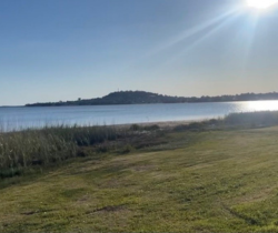 Light reflecting off the water of Lake Illawarra.