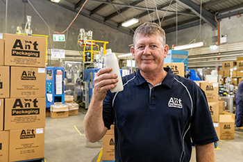 man holding a plastic bottle